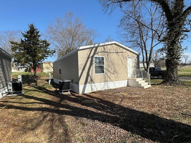 view of property exterior with cooling unit