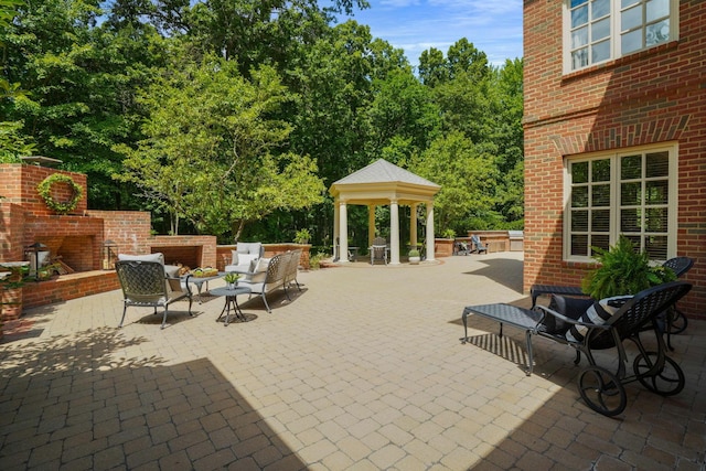 view of patio / terrace with a gazebo and an outdoor hangout area