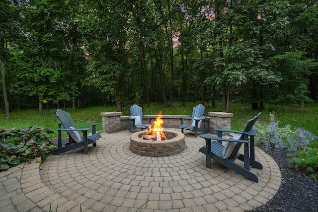 view of patio with an outdoor fire pit