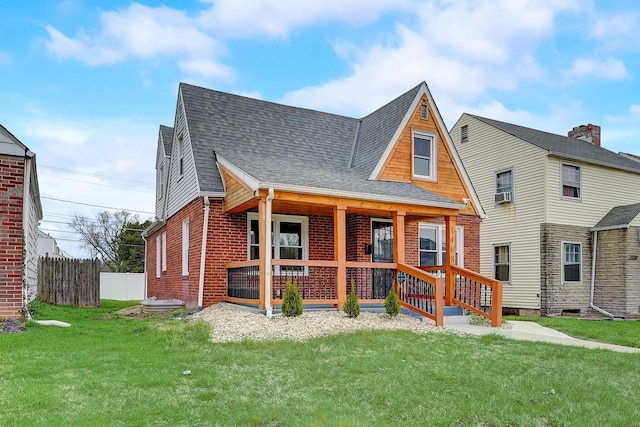 1468 E Whittier St, Columbus, OH 43206 - view of front of home with brick siding, roof with shingles, and covered porch