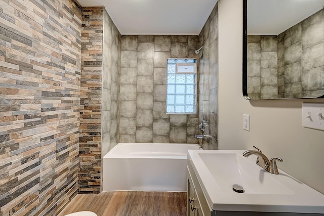 1468 E Whittier St, Columbus, OH 43206 - bathroom with vanity, wood finished floors, and shower / bathtub combination