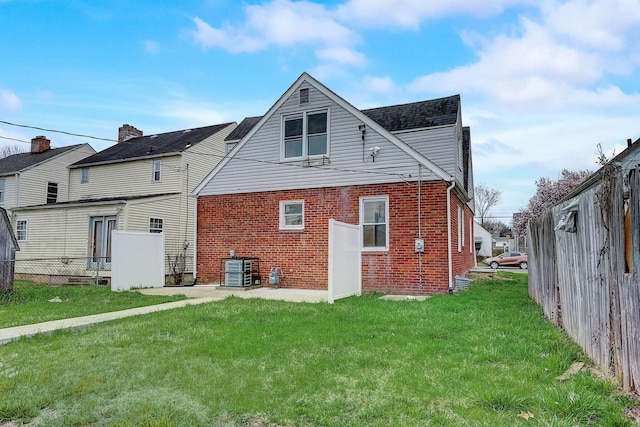 1468 E Whittier St, Columbus, OH 43206 - rear view of property featuring brick siding