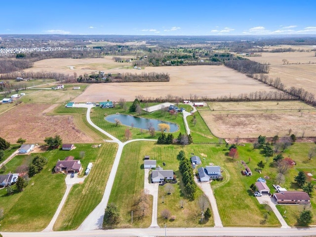 aerial view featuring a rural view and a water view