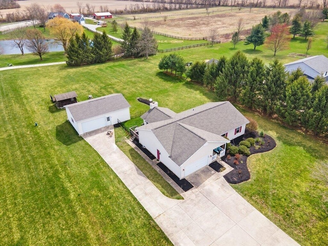 aerial view with a water view and a rural view