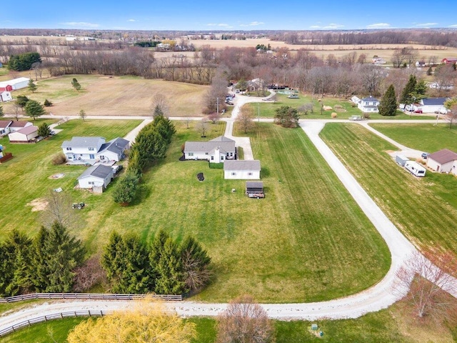 birds eye view of property featuring a rural view