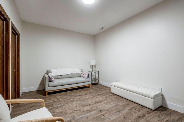 living area featuring light hardwood / wood-style floors