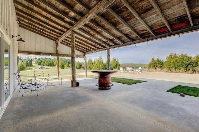 view of patio featuring an outdoor fire pit