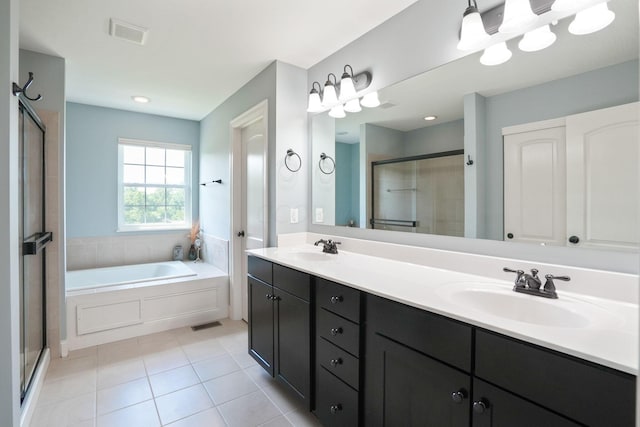 bathroom featuring vanity, tile patterned flooring, and independent shower and bath