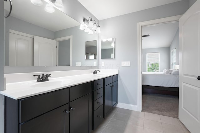 bathroom featuring tile patterned floors and vanity