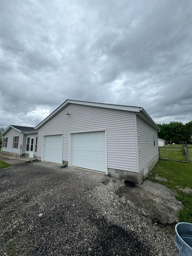 view of property exterior featuring a garage