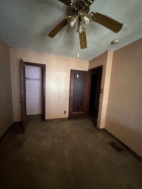 unfurnished room featuring ceiling fan