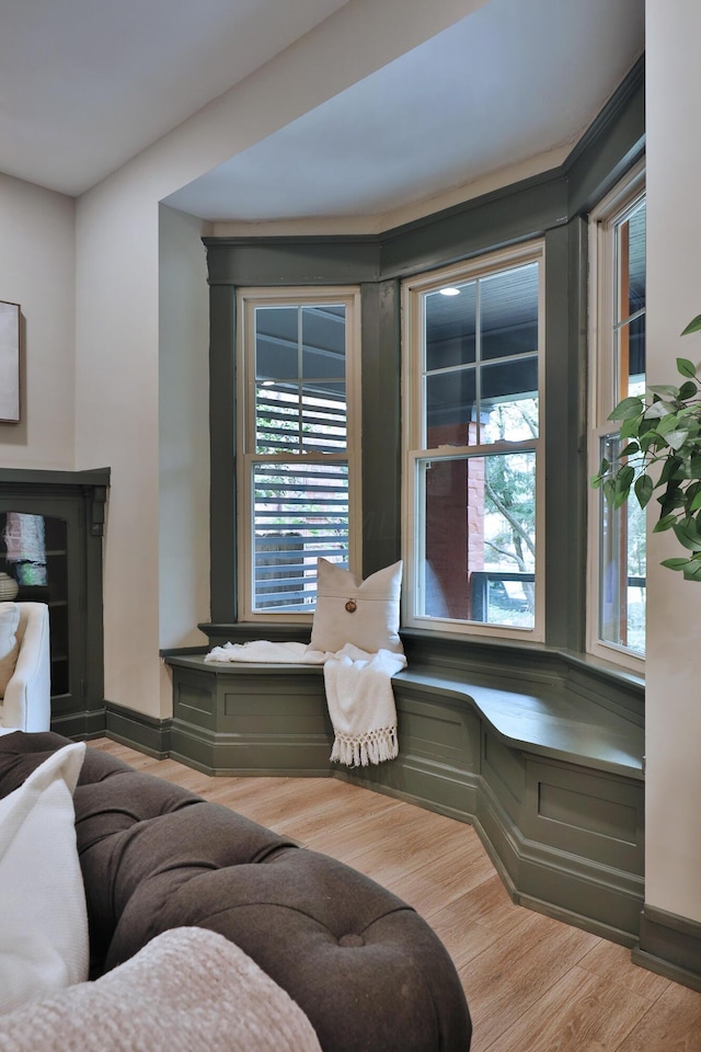 sitting room with light hardwood / wood-style floors