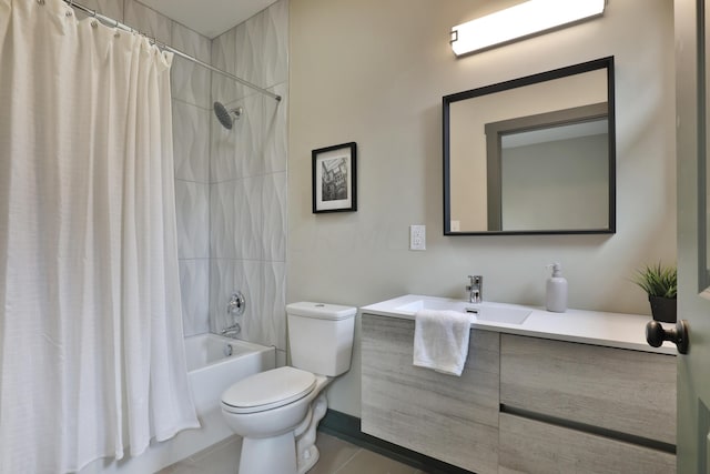 full bathroom featuring tile patterned flooring, shower / bath combo, vanity, and toilet