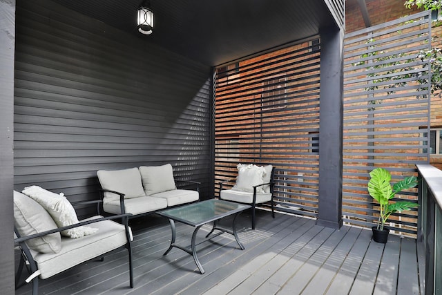 deck featuring an outdoor living space