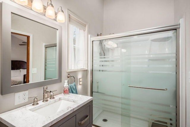 bathroom featuring vanity and walk in shower