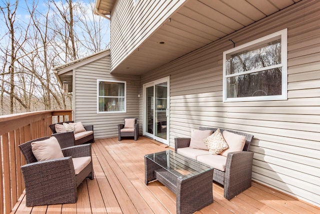 wooden deck with an outdoor hangout area