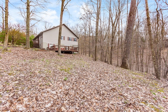 exterior space featuring a wooden deck