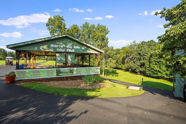 view of community featuring a yard