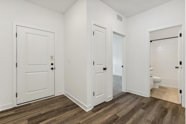 entryway featuring dark hardwood / wood-style floors