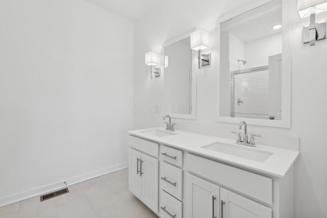 bathroom with vanity and walk in shower