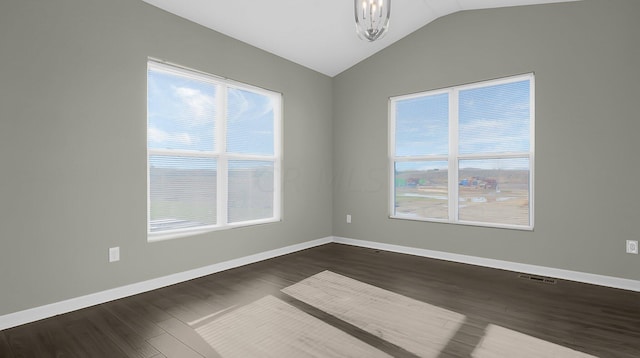 unfurnished room featuring dark hardwood / wood-style flooring, an inviting chandelier, and vaulted ceiling