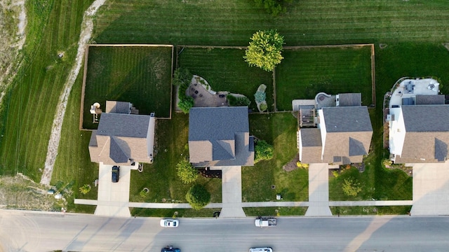 birds eye view of property with a rural view