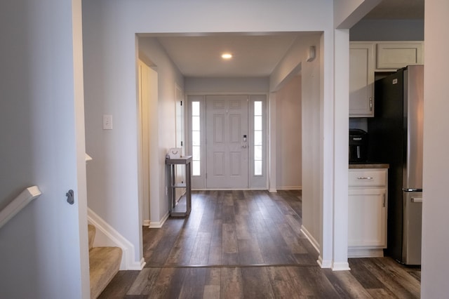 entrance foyer with dark hardwood / wood-style flooring