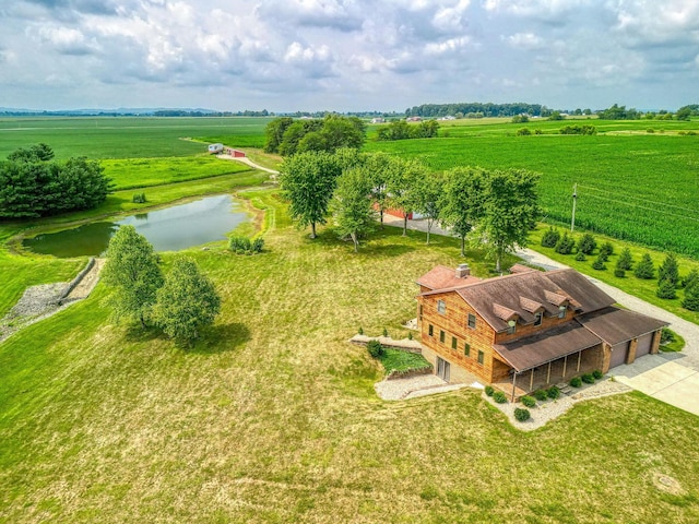 aerial view featuring a water view and a rural view