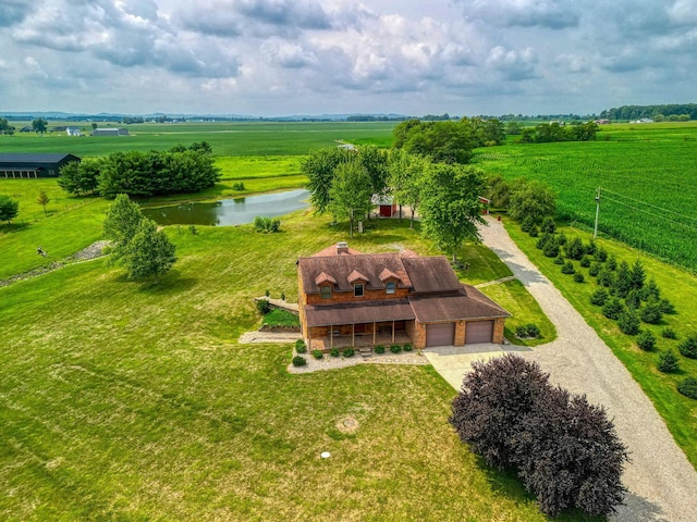 bird's eye view featuring a rural view and a water view