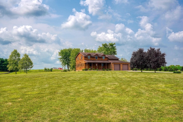 view of yard with a garage