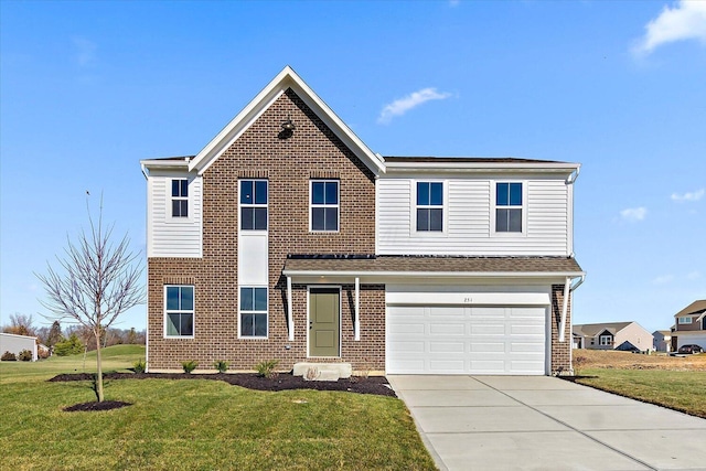 view of front of house featuring a front yard and a garage