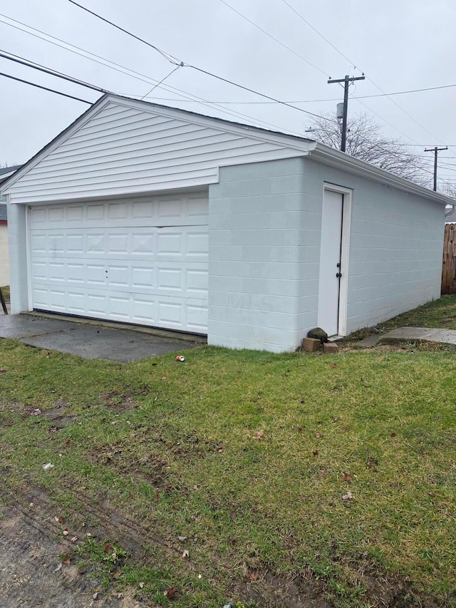 garage with a lawn