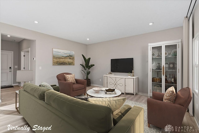 living room featuring light hardwood / wood-style floors