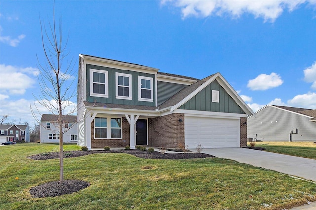 view of front of home featuring a garage and a front lawn