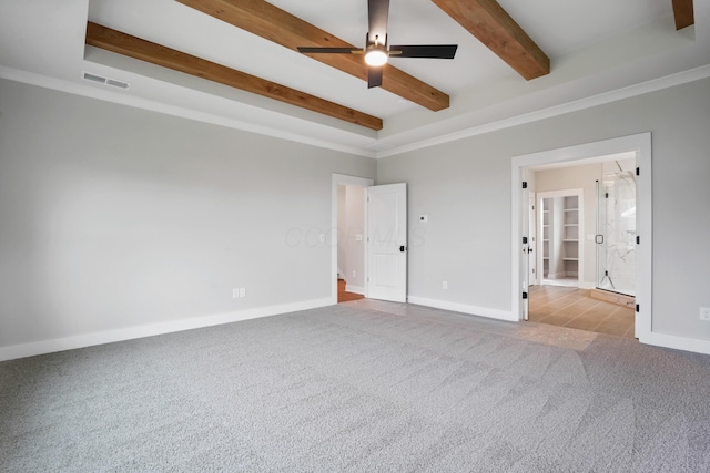 interior space with beam ceiling, light colored carpet, ceiling fan, and crown molding