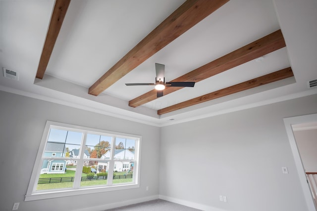 interior details featuring beamed ceiling and ceiling fan