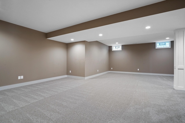 basement with light colored carpet