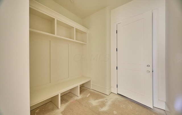 mudroom featuring concrete flooring