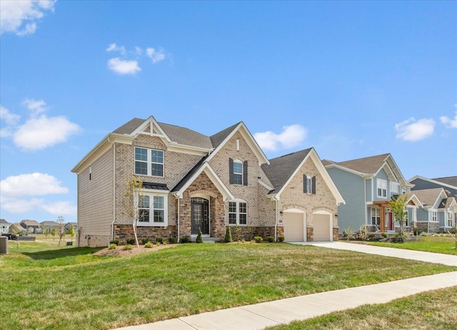 view of front of home with a garage, central air condition unit, and a front yard