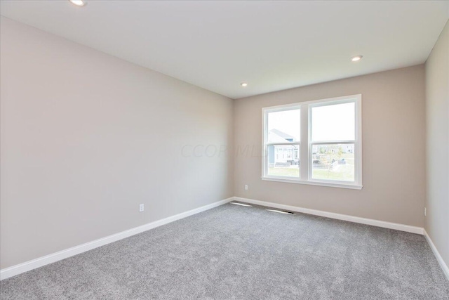 empty room with carpet floors