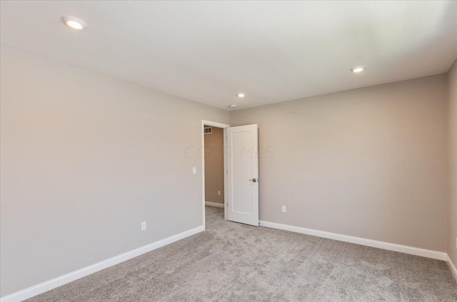 view of carpeted spare room