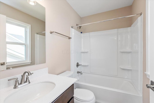 full bathroom with washtub / shower combination, vanity, and toilet