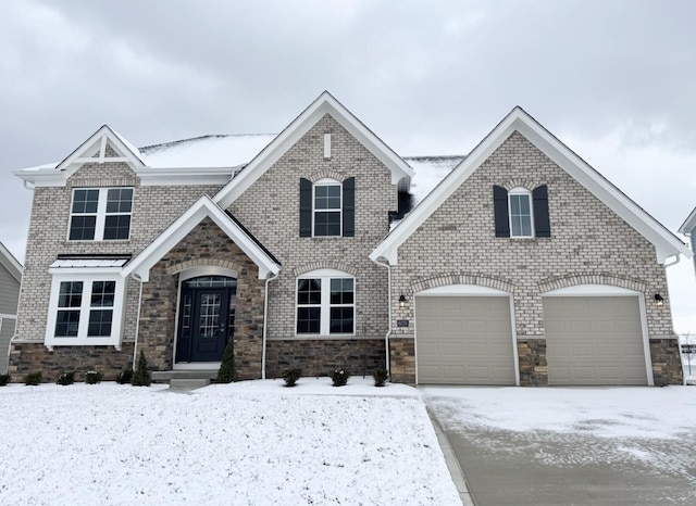 view of front of property featuring a garage