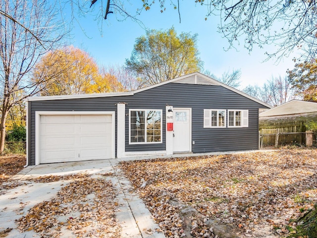 ranch-style house featuring a garage