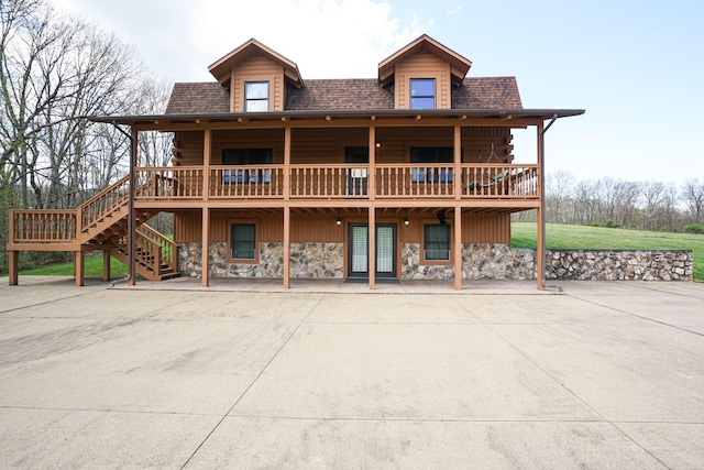 exterior space featuring a wooden deck