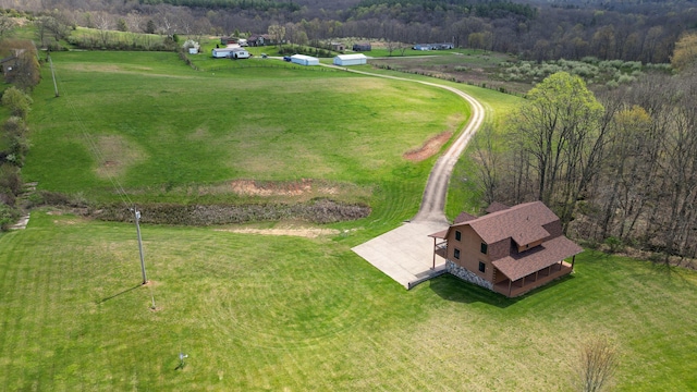 birds eye view of property featuring a rural view