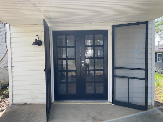 doorway to property featuring french doors