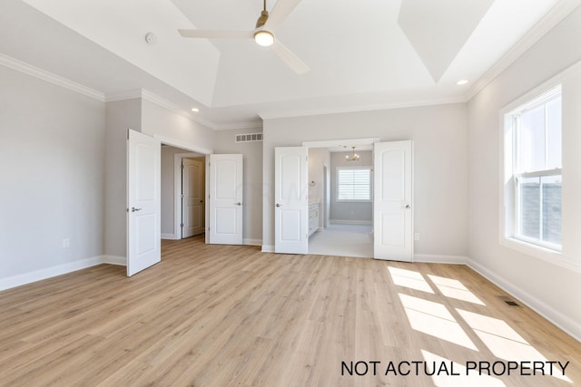 unfurnished bedroom featuring ceiling fan, light hardwood / wood-style floors, and crown molding