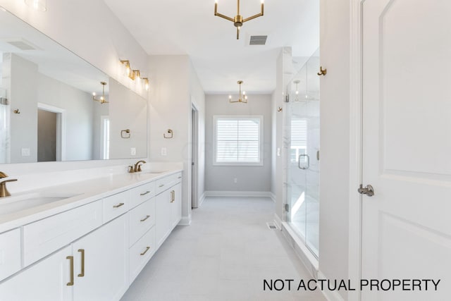 bathroom featuring vanity and walk in shower