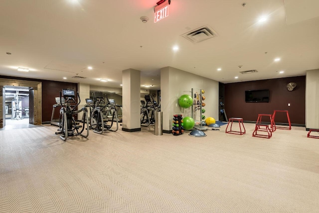 workout area with light colored carpet